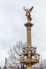 The statue of the Muse or angel near Rudolfinum building in Prague.