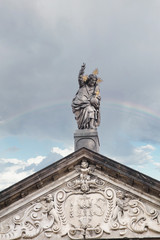 A close-up on the details of the facade decorated with sculptures at the Cathedral of Saint Salvator in Prague