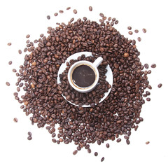 Cup with coffee. Coffee beans on a white background