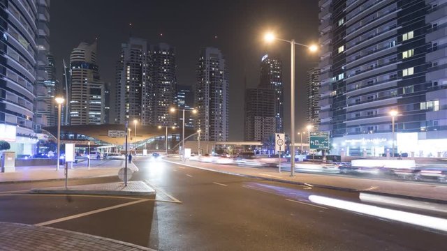 Night Traffic flow on Jumeirah Lakes Towers in Dubai City.