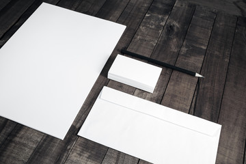 Photo of blank corporate identity. Stationery set. Branding mockup. Sheet of paper, letterhead, business cards, envelope and pencil.