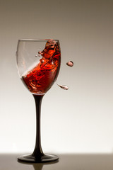 red wine splash in a glass