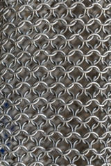 Texture of chainmail of a medieval armor knight, Pattern, background, closeup, detail