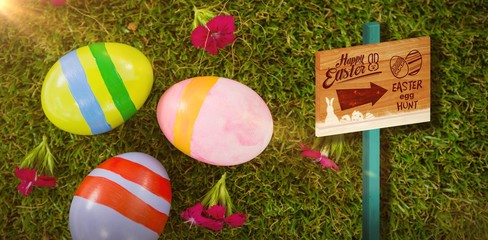 Composite image of easter egg hunt sign