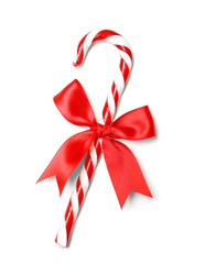 Christmas candy cane with bow isolated on white