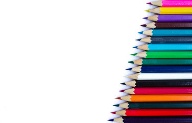 Colored pencils isolated on white background