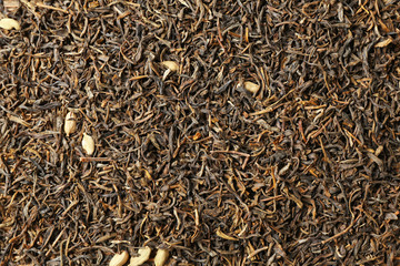 Dry tea leaves background