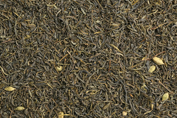 Dry tea leaves background