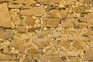 A background of a stone with orange tone