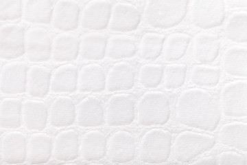 White background from soft upholstery textile material, closeup. Fabric with pattern