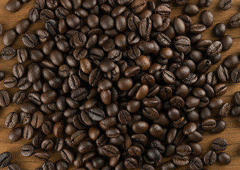 coffee beans on table wood background