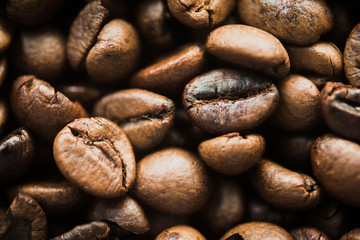 Roasted coffee beans background.