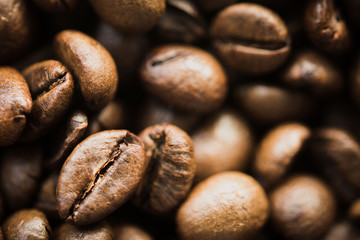 Roasted coffee beans background.