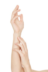 Nothing but soft. Studio shot of beautiful hands of a fresh-skinned model at the studio on white background copyspace on the side.