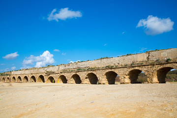 Ancient roman aqueduct in Caesarea, sightseeings in Israel.