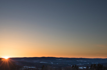Sunset over Mountains in Winter
