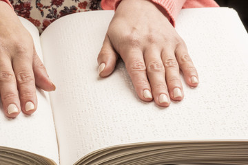 Books Braille. The touch of your fingertips the texture of the paper, reading the sign. Reading the...