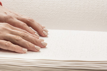 Books Braille. The touch of your fingertips the texture of the paper, reading the sign. Reading the...