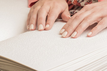 Books Braille. The touch of your fingertips the texture of the paper, reading the sign. Reading the...