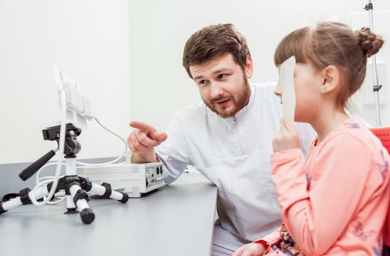 Orthoptics. Pleoptics. Doctor explains how to use ophthalmic equipment. Eye training. Vision rehabilitation.