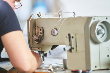 Seamstress worker in factory