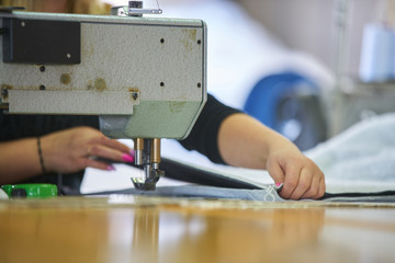 Seamstress worker in factory