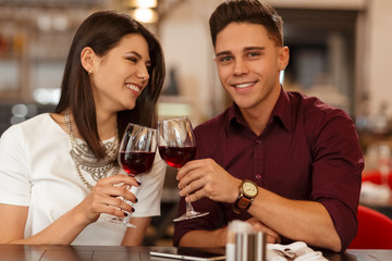 Stunning couple having a date at the restaurant