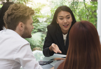 business women talking about work in office