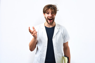 Bearded caucasian doctor or postgraduate student with clipboard