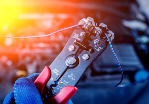 Repairing engine at service station. Car repair.