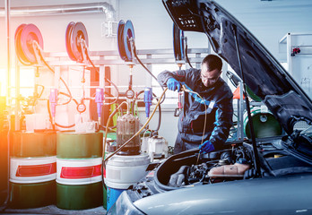 Engine oil change. Car repair.