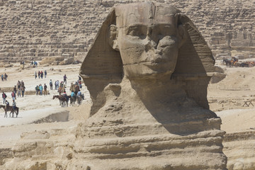 Closeup view of the Sphinx head with pyramid in Giza near Cairo, Egypt
