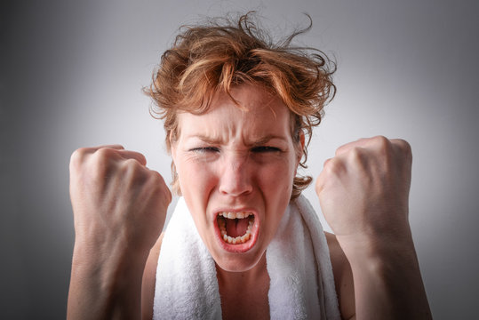 Power woman. Strong, confident and determinated female screaming ready for action
