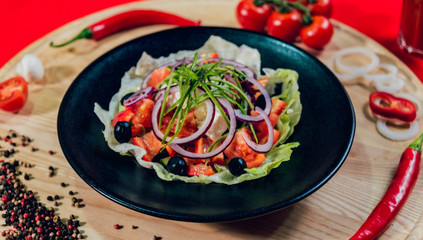 Greek salad from cabbage, olives and mozzarella
