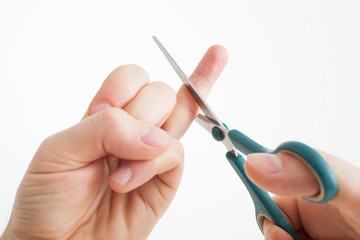 The man jokingly cuts off his ring finger, he does not want to marry