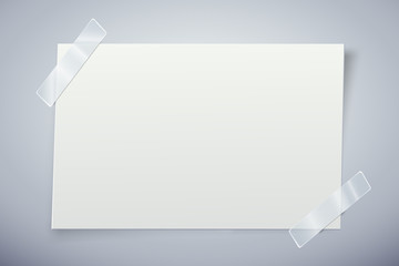 White paper note with the adhesive tape.