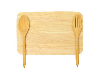 wooden spoon and fork on wooden board against white background