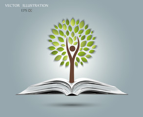 Tree on open book.