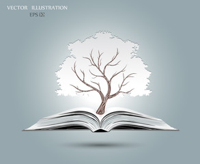 Tree on open book.
