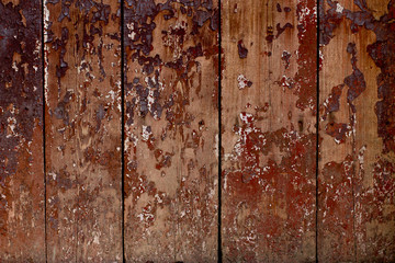 Old wood background with peeling paint.