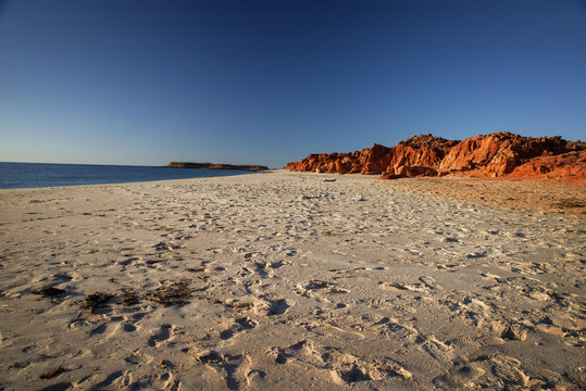 Western Australia – rocky coastline with red colored rocks at Dampier Peninsula