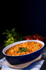 fish with vegetables in tomato sauce