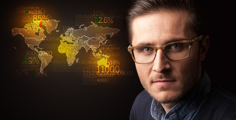 Portrait of a young businessman on dark background