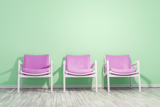armchairs green wall
