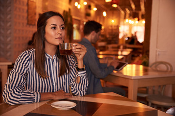 Lovely millenial girl looking far away