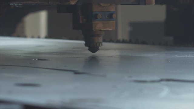 EXTREME CU of automatic CNC plasma cutting machine working with an aluminum sheet