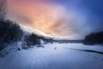 Winter sunrise in forest and river near the russian orthodox church, fantastic winter nature landscape, wallpaper