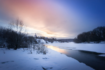 Winter sunrise in forest and river near the russian orthodox church, fantastic winter nature landscape, wallpaper