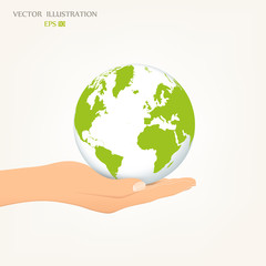 Green globe on her hand.