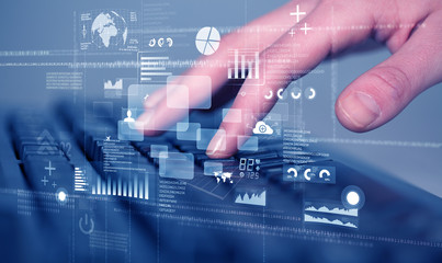 Keyboard buttons pressed by hand with high tech icons